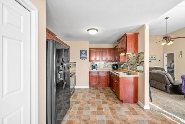 kitchen with sink, decorative backsplash, ceiling fan, and black appliances