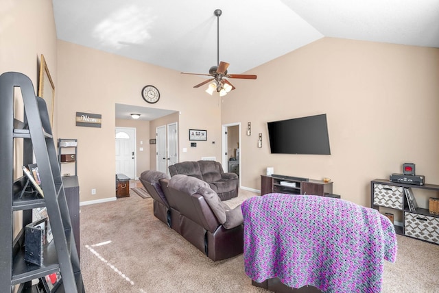 living room featuring carpet floors, vaulted ceiling, and ceiling fan