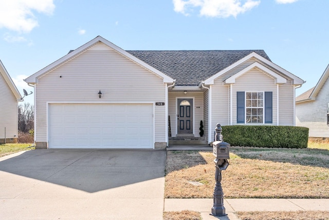 ranch-style house featuring a garage