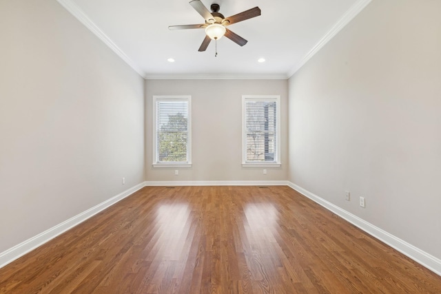 unfurnished room featuring hardwood / wood-style flooring, ceiling fan, and ornamental molding