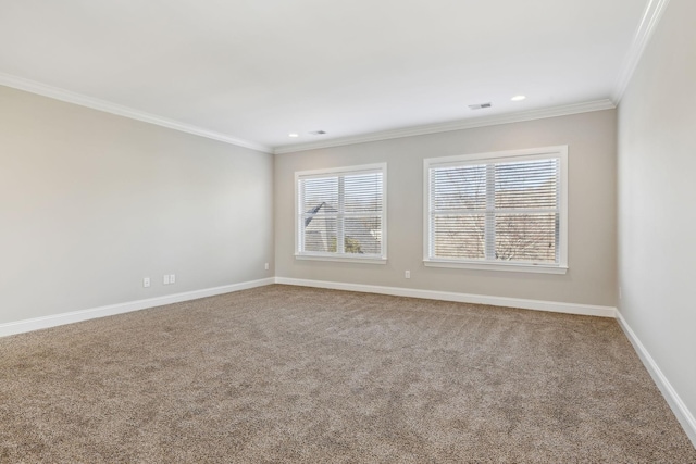 unfurnished room featuring crown molding and carpet flooring