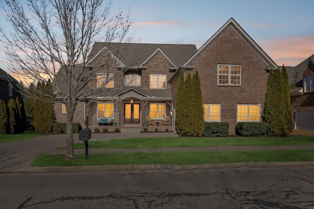 view of front of house with a lawn