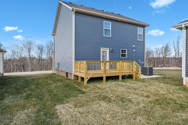 rear view of house featuring a yard, central AC, and a deck