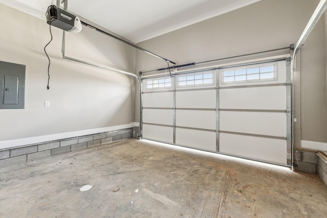 garage featuring a garage door opener and electric panel