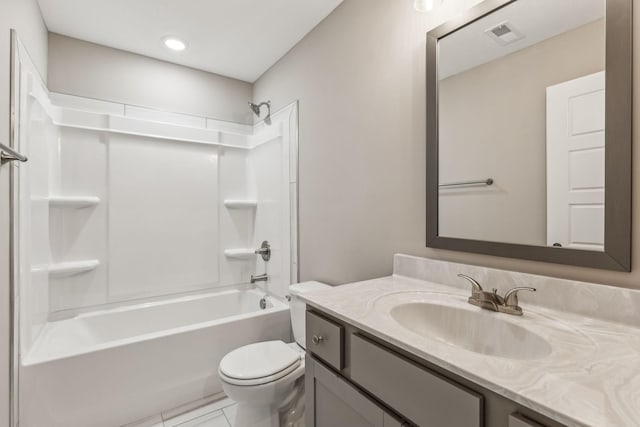 full bathroom featuring vanity, shower / tub combination, tile patterned floors, and toilet