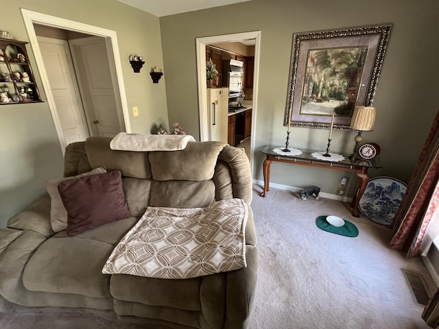 living room featuring carpet