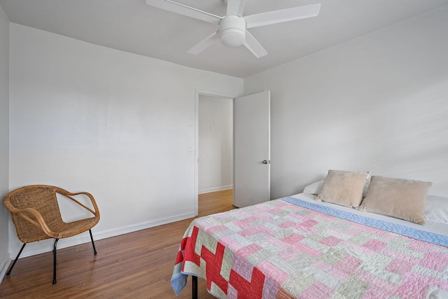 bedroom featuring ceiling fan and wood-type flooring