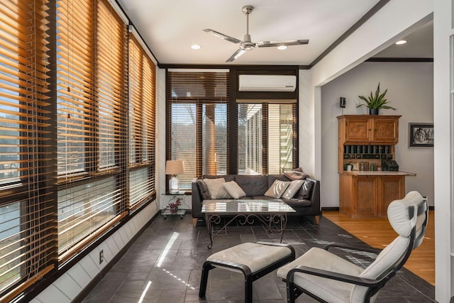 sunroom / solarium featuring a wall mounted air conditioner and ceiling fan