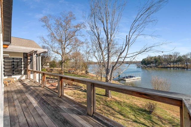 wooden terrace with a water view