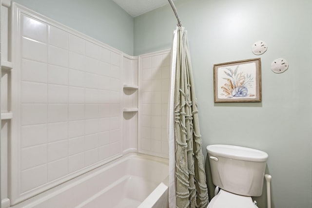 bathroom with shower / tub combo with curtain and toilet