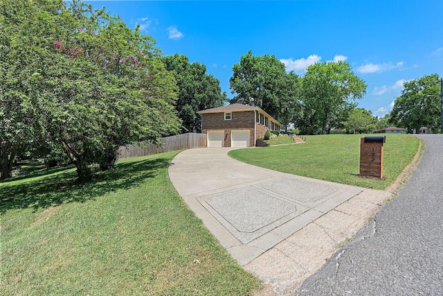 exterior space featuring a garage and a front yard