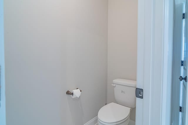 bathroom featuring tile patterned floors and toilet