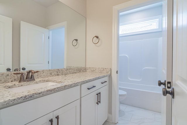 full bathroom with vanity, shower / bathing tub combination, and toilet