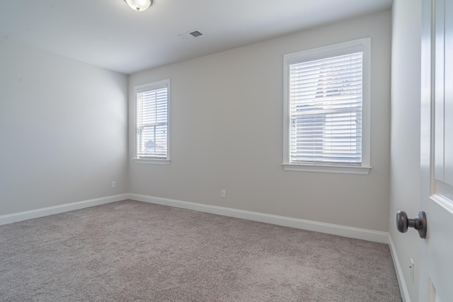 view of carpeted spare room