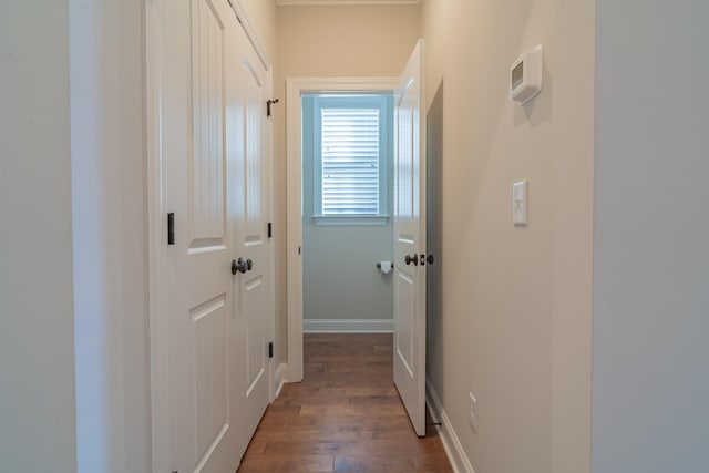 hallway with dark wood-type flooring