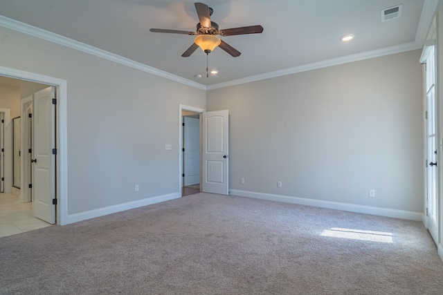 unfurnished bedroom featuring ornamental molding, light carpet, and ceiling fan