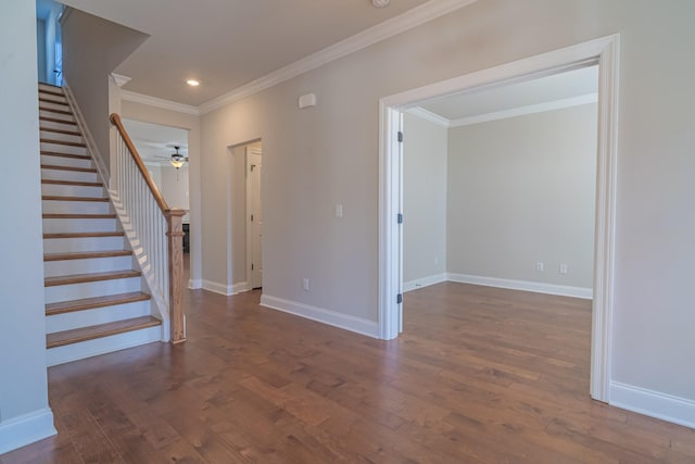 interior space with ornamental molding, ceiling fan, and dark hardwood / wood-style flooring