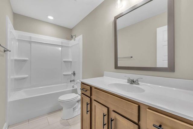 full bathroom with tile patterned flooring, vanity, tub / shower combination, and toilet