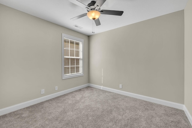 empty room with light carpet and ceiling fan