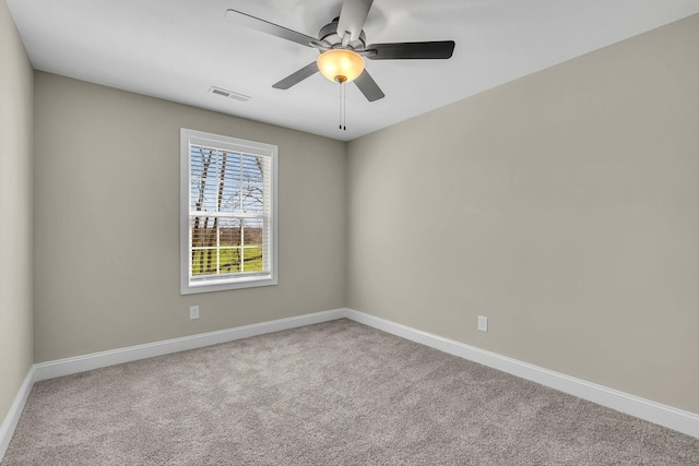 carpeted empty room with ceiling fan