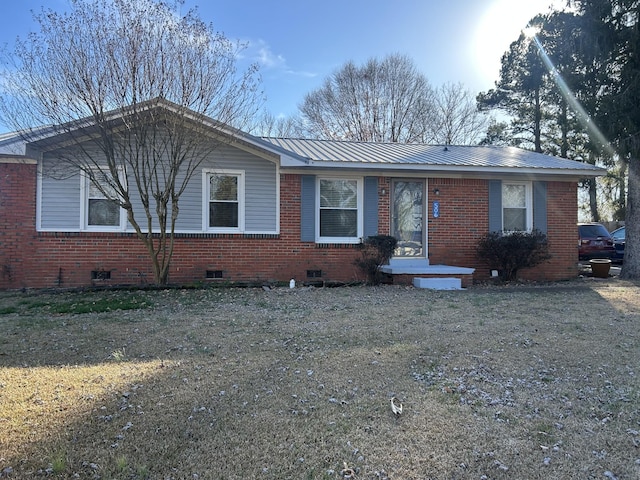 single story home with a front yard