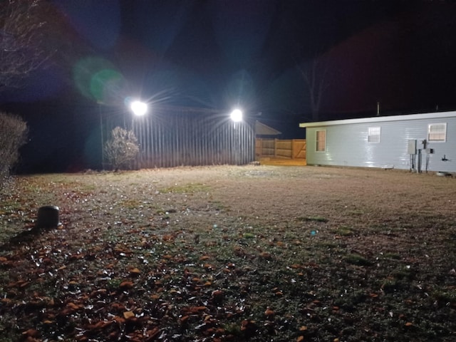 view of yard at night