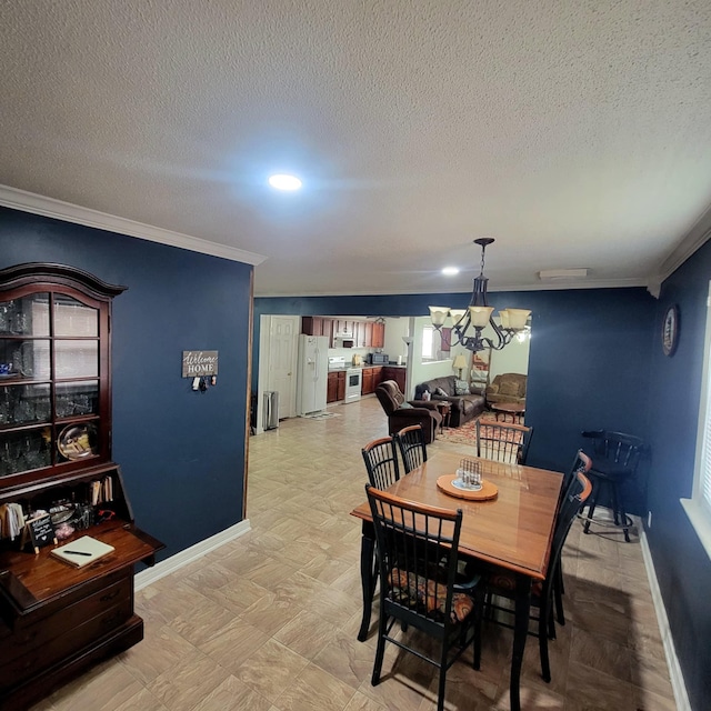 dining area featuring a notable chandelier, crown molding, and a textured ceiling