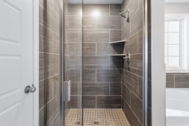 bathroom with independent shower and bath