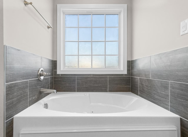 bathroom with a bathing tub