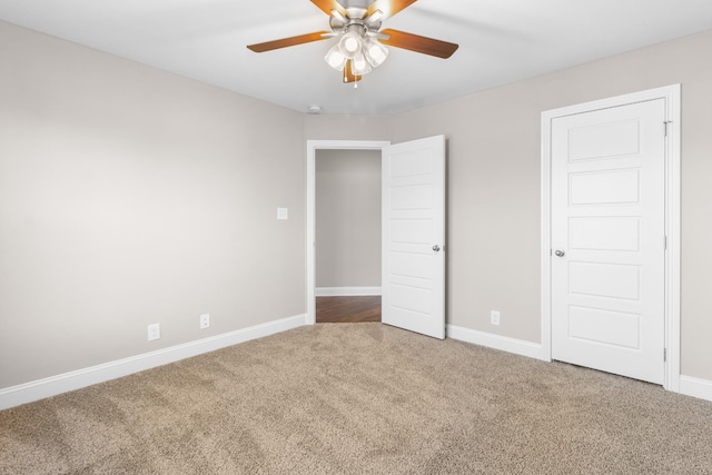 unfurnished bedroom with carpet floors and ceiling fan