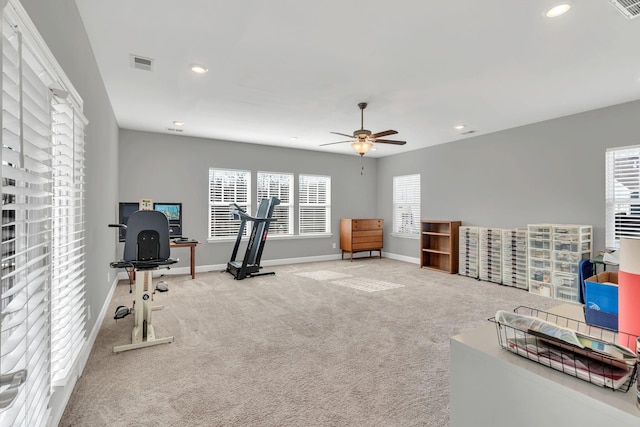 exercise room featuring carpet floors and ceiling fan