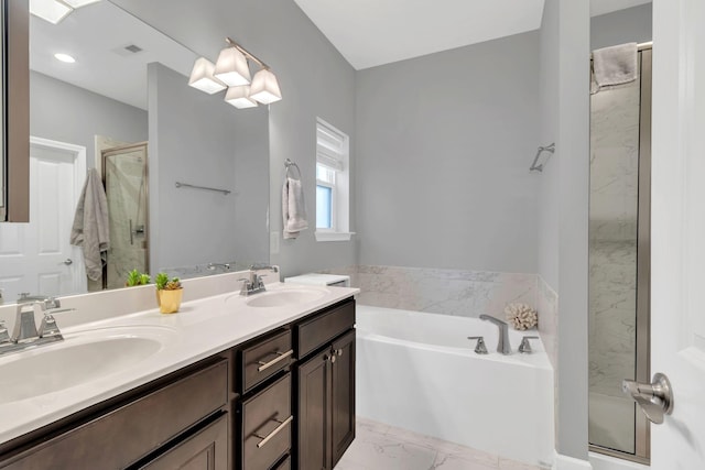 bathroom with vanity and plus walk in shower