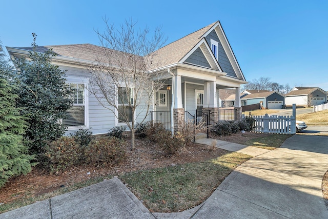 view of front of property featuring covered porch