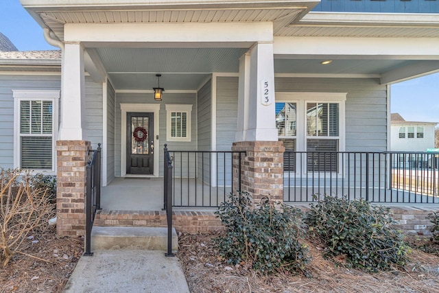 entrance to property with a porch