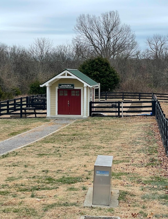 view of outbuilding featuring a yard