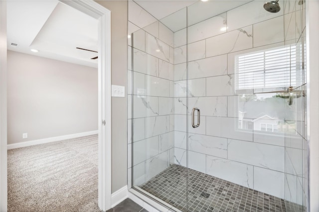 bathroom featuring a shower with shower door