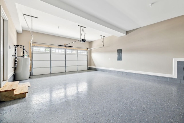 garage featuring water heater, a garage door opener, and electric panel