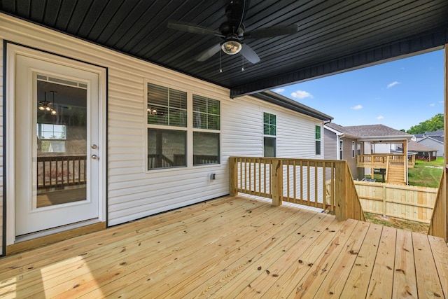 wooden terrace featuring ceiling fan