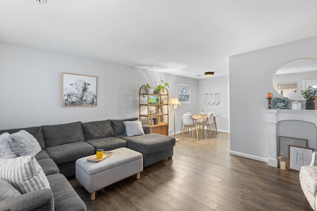 living room with dark hardwood / wood-style floors