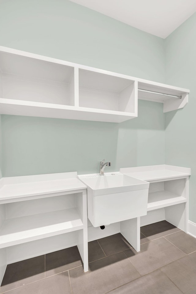 laundry room featuring tile patterned flooring