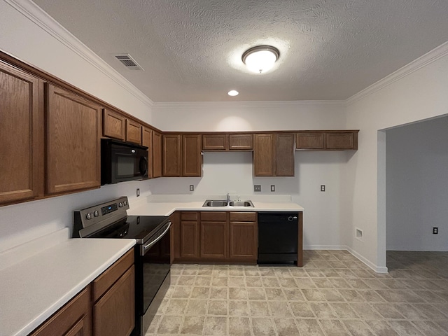 kitchen with crown molding, sink, a textured ceiling, and black appliances