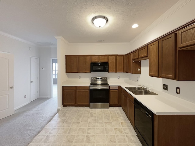 kitchen with sink, ornamental molding, black appliances, light carpet, and a textured ceiling