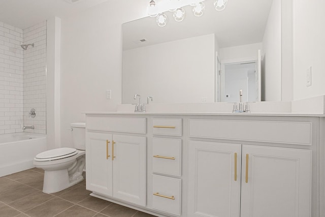 full bathroom with vanity, toilet, tiled shower / bath combo, and tile patterned flooring