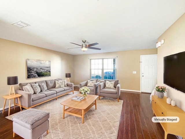 living room with hardwood / wood-style flooring and ceiling fan