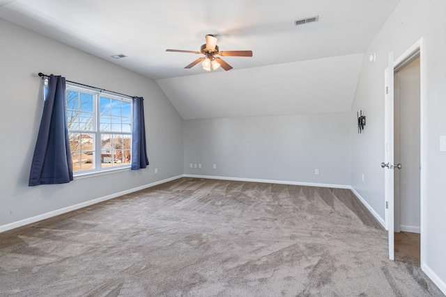 bonus room with carpet floors, vaulted ceiling, and ceiling fan