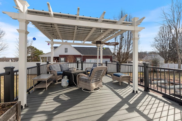 wooden terrace featuring outdoor lounge area and a pergola