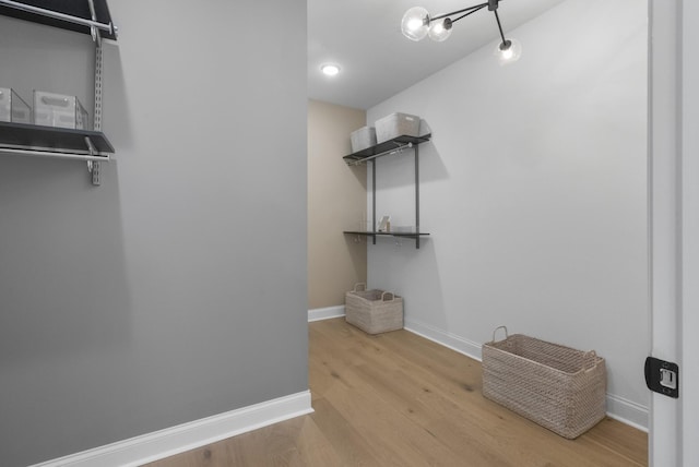 walk in closet featuring light wood-type flooring