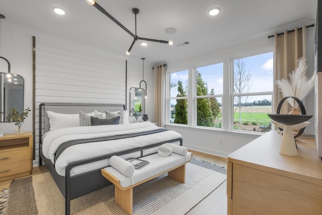 bedroom featuring light hardwood / wood-style flooring