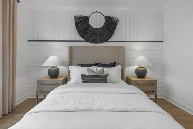 bedroom featuring dark wood-type flooring