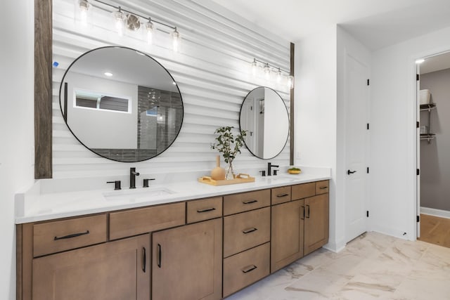 bathroom featuring vanity and a shower